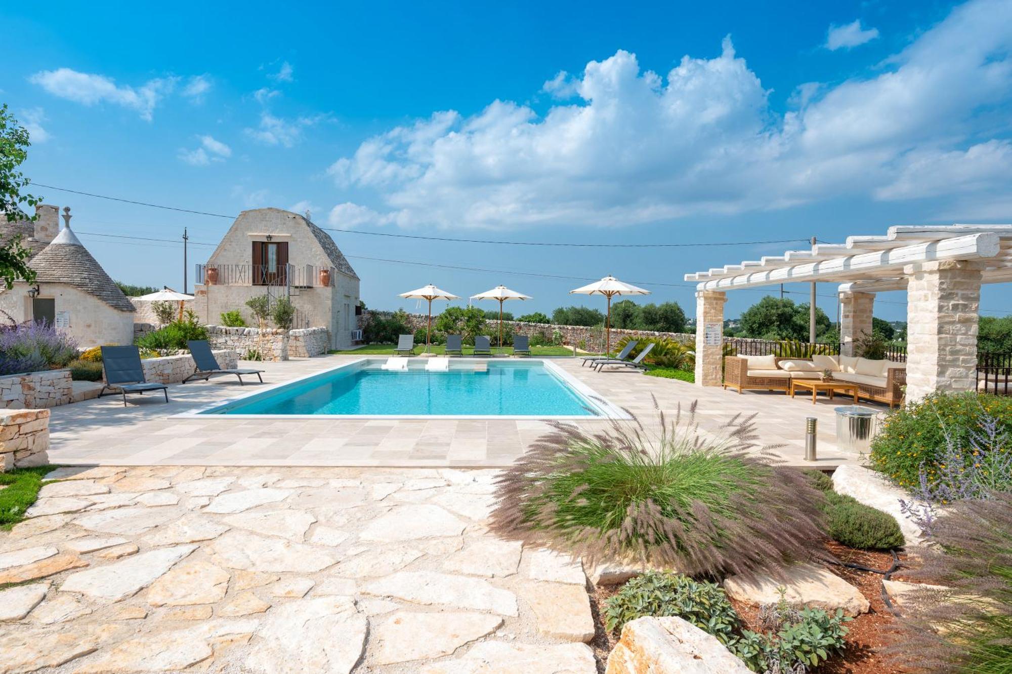 Acres Itria Villa โลโกโรตอนโด ภายนอก รูปภาพ